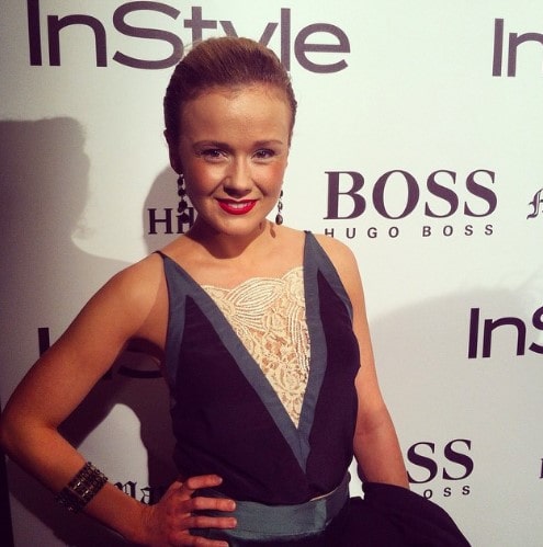 Picture of Arianwen Parkes-Lockwood posing for a photoshoot  wearing black color gown